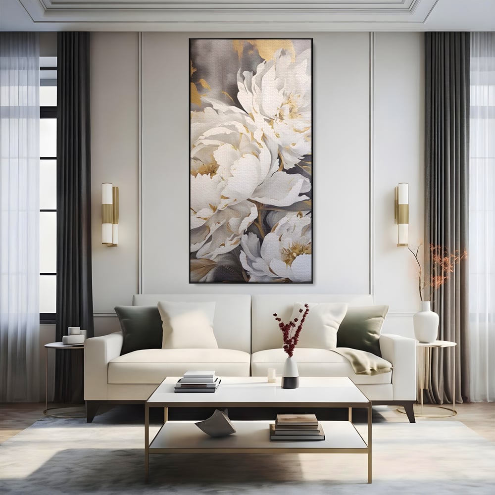 Tablou canvas cu pictura cu bujori albi si accente aurii, in rama de aluminiu negru, pe perete intr-un living